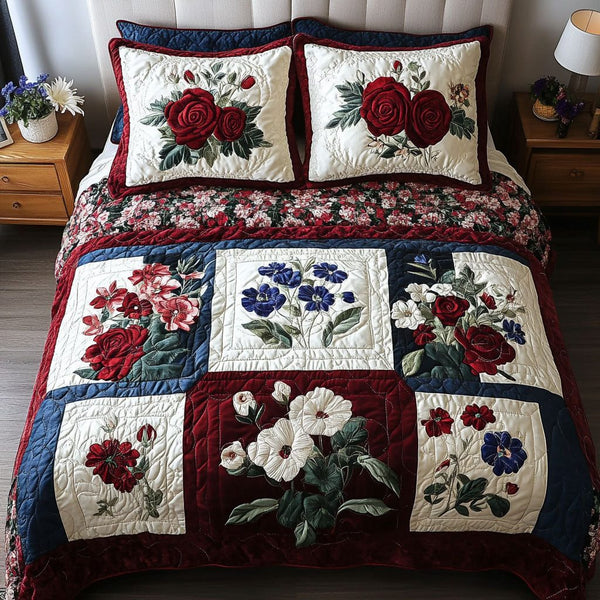 Brave Blossoms quilted 3-piece bedding set on a made bed with two matching pillow shams