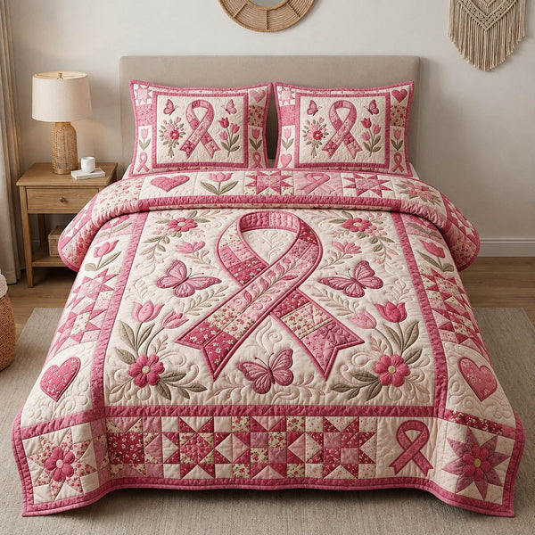 Breast Cancer quilted 3-piece bedding set on a made bed with two matching pillow shams