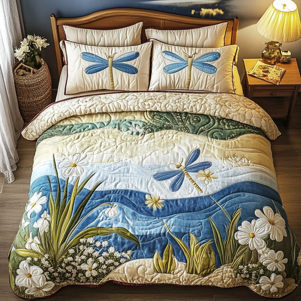 Breeze Whispers quilted 3-piece bedding set on a made bed with two matching pillow shams
