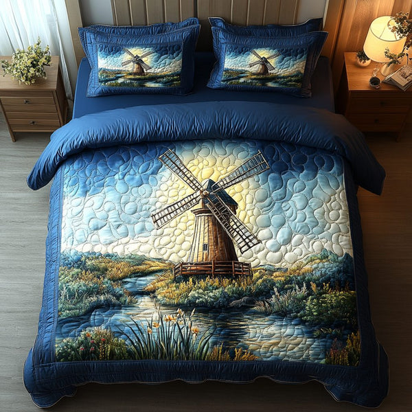 Breezy Charm quilted 3-piece bedding set on a made bed with two matching pillow shams
