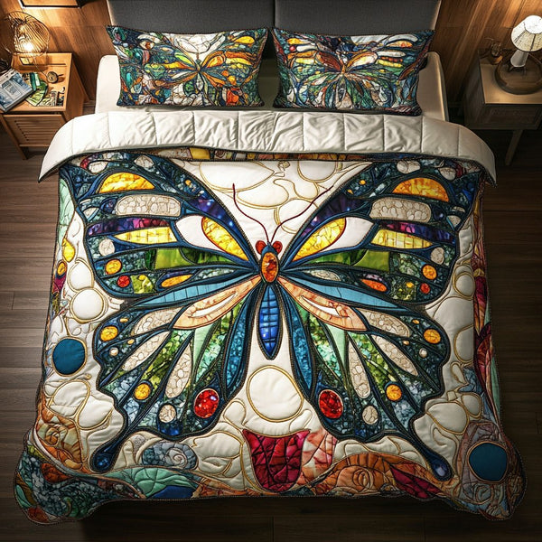 Breezy Elegance quilted 3-piece bedding set on a made bed with two matching pillow shams