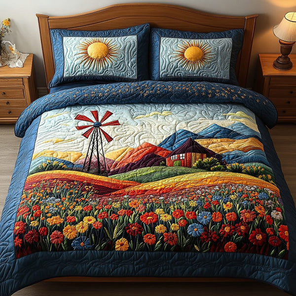 Breezy Meadows quilted 3-piece bedding set on a made bed with two matching pillow shams