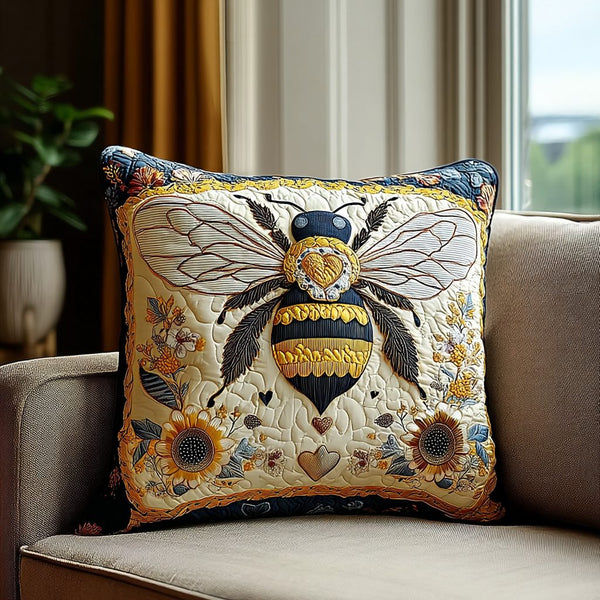 Bright Bee Quilted Pillow Case quilted 3-piece bedding set on a made bed with two matching pillow shams