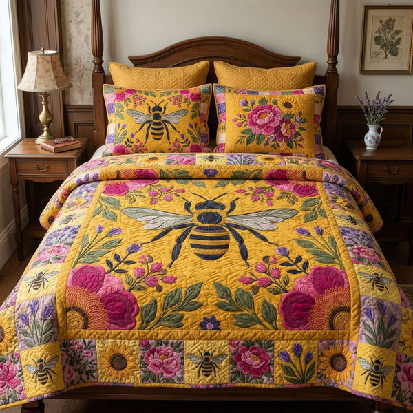 Bright Garden Bee quilted 3-piece bedding set on a made bed with two matching pillow shams