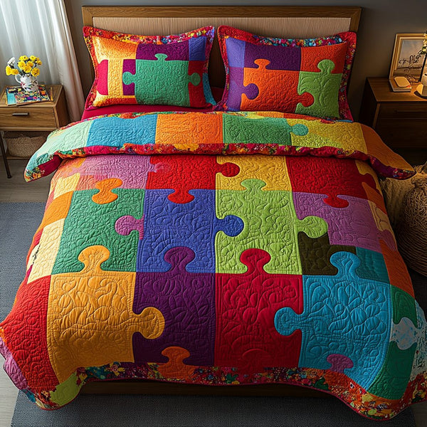 Bright Puzzle Blocks quilted 3-piece bedding set on a made bed with two matching pillow shams