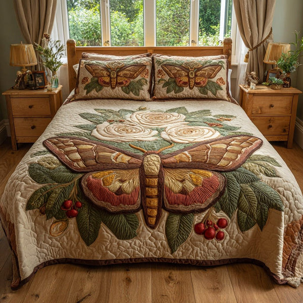 Brown Moth quilted 3-piece bedding set on a made bed with two matching pillow shams
