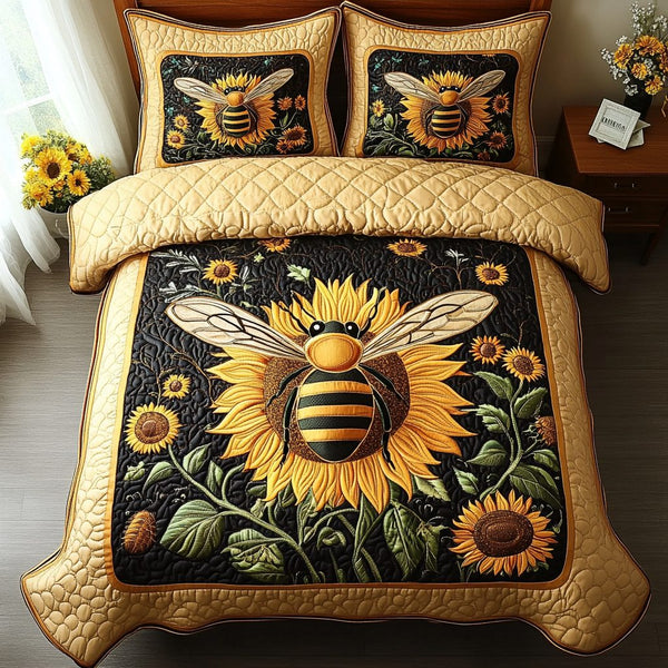 Bumble Bliss quilted 3-piece bedding set on a made bed with two matching pillow shams