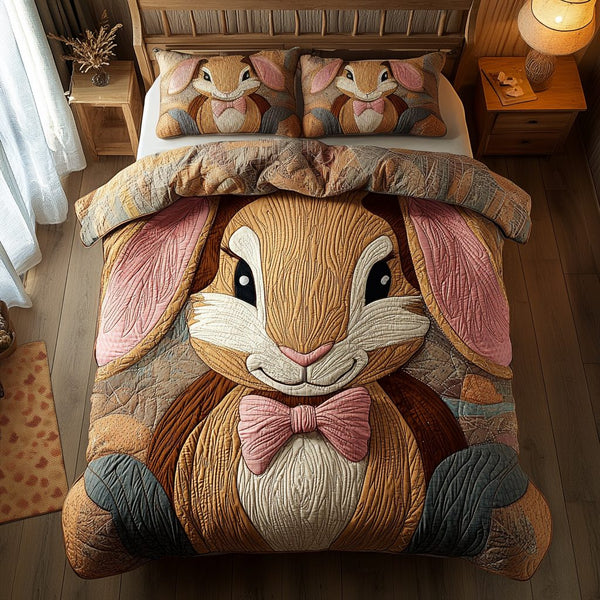 Bunny Bliss quilted 3-piece bedding set on a made bed with two matching pillow shams
