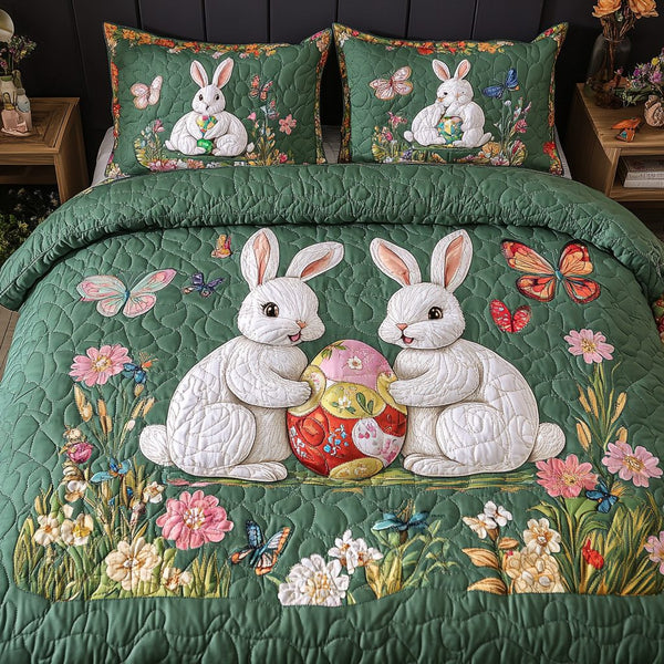 Bunny Bliss quilted 3-piece bedding set on a made bed with two matching pillow shams