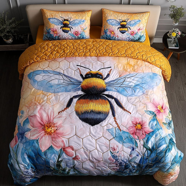 Busy Bee Bliss quilted 3-piece bedding set on a made bed with two matching pillow shams