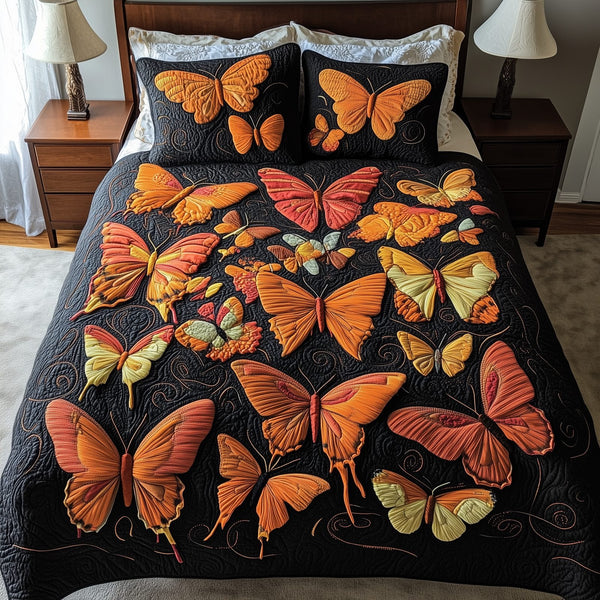 Butterflies Deep Night quilted 3-piece bedding set on a made bed with two matching pillow shams
