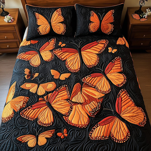 Butterflies Deep Night quilted 3-piece bedding set on a made bed with two matching pillow shams