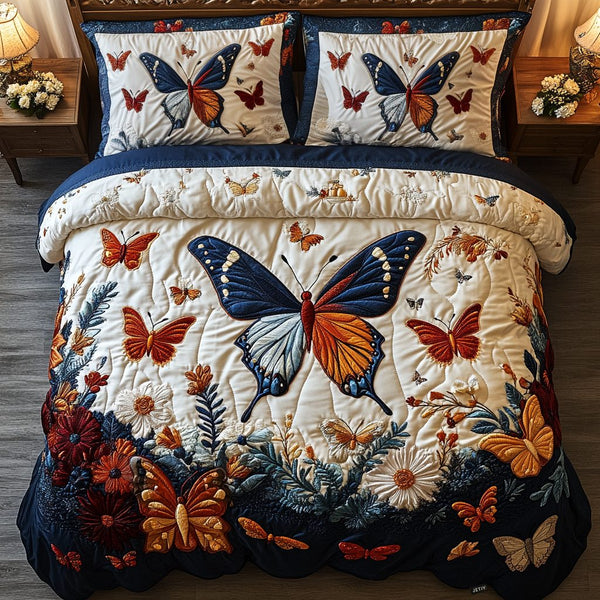 Butterfly Bliss quilted 3-piece bedding set on a made bed with two matching pillow shams
