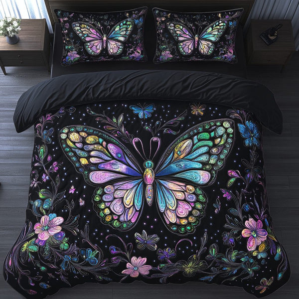Butterfly Bliss quilted 3-piece bedding set on a made bed with two matching pillow shams