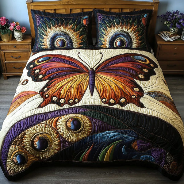 Butterfly Bliss quilted 3-piece bedding set on a made bed with two matching pillow shams