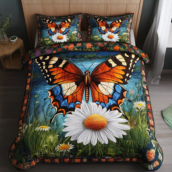 Butterfly Bliss quilted 3-piece bedding set on a made bed with two matching pillow shams