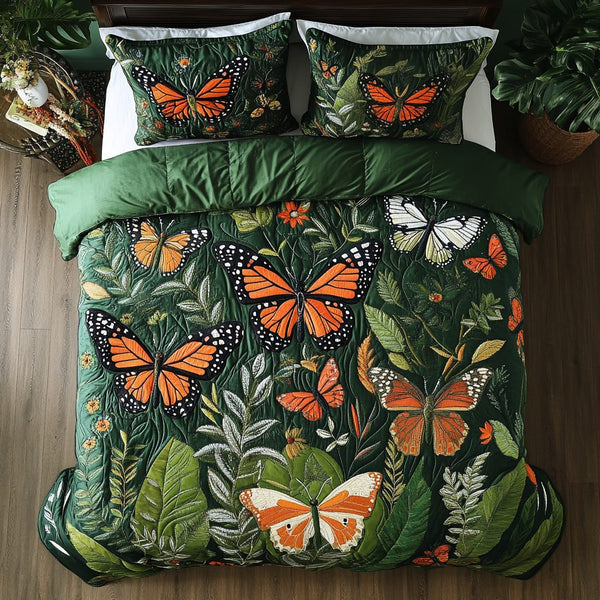 Butterfly Bliss quilted 3-piece bedding set on a made bed with two matching pillow shams