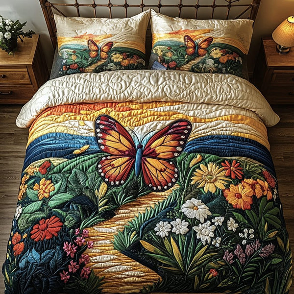 Butterfly Bliss quilted 3-piece bedding set on a made bed with two matching pillow shams