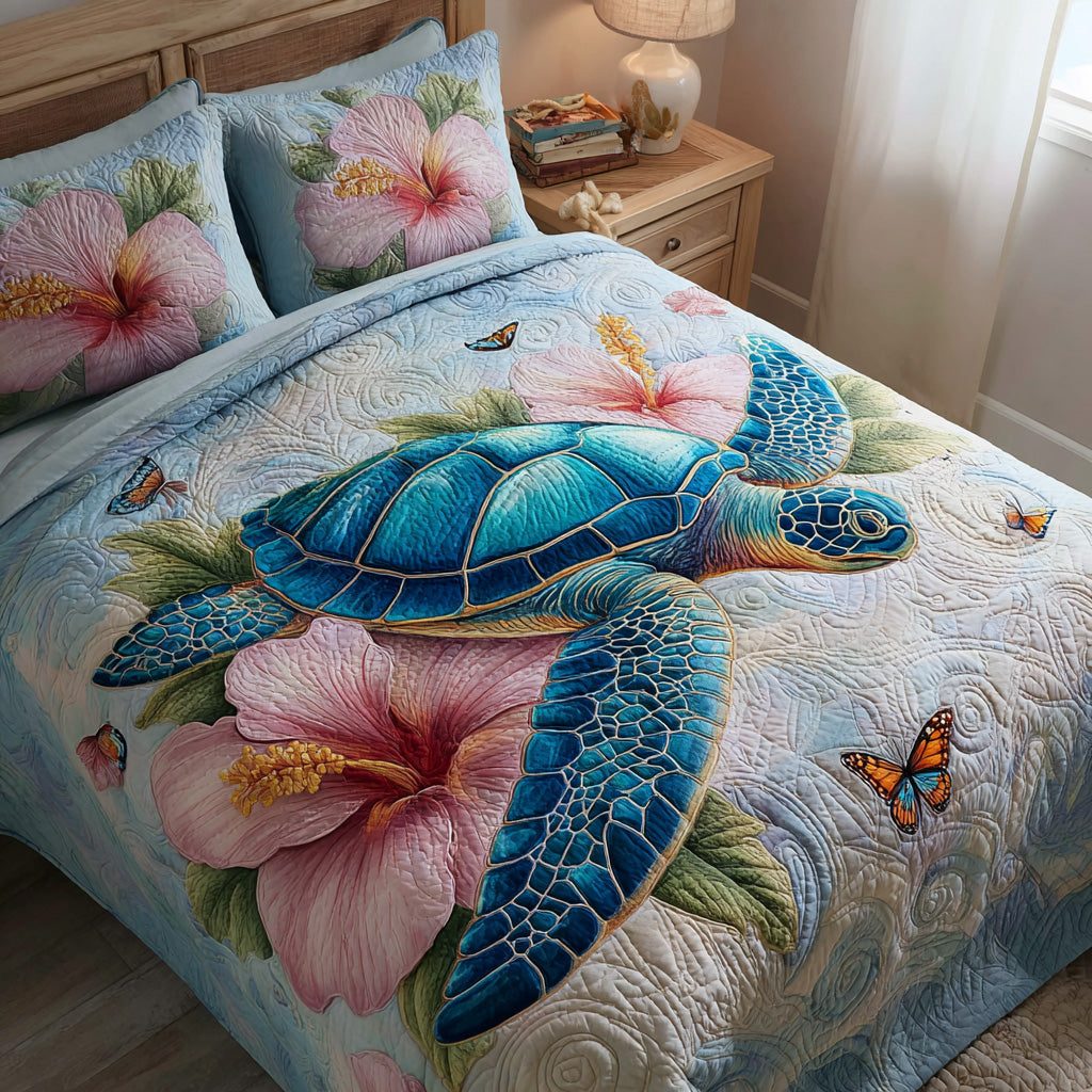 Butterfly Bloom quilted 3-piece bedding set on a made bed with two matching pillow shams