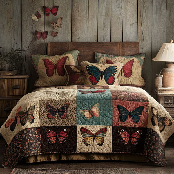 Butterfly Blooms quilted 3-piece bedding set on a made bed with two matching pillow shams