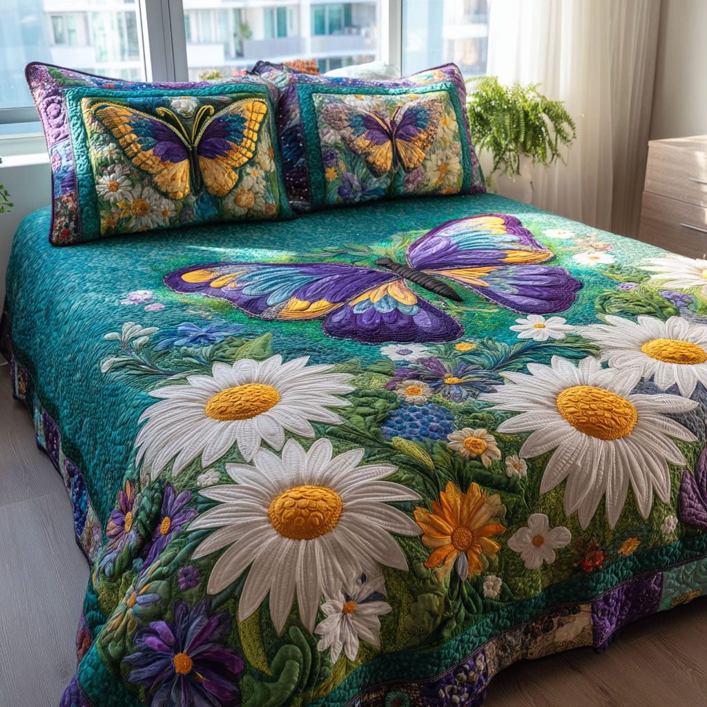 Butterfly Blossom quilted 3-piece bedding set on a made bed with two matching pillow shams