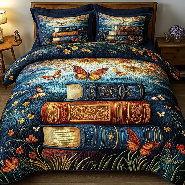 Butterfly Book Garden quilted 3-piece bedding set on a made bed with two matching pillow shams
