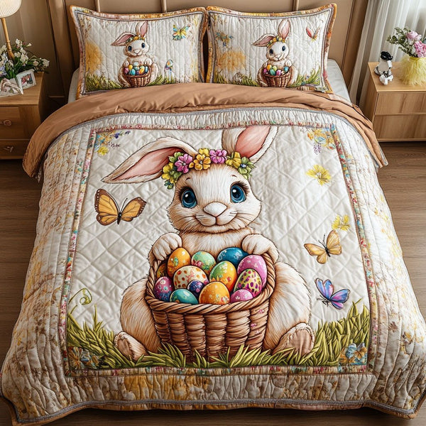 Butterfly Bunny Bliss quilted 3-piece bedding set on a made bed with two matching pillow shams