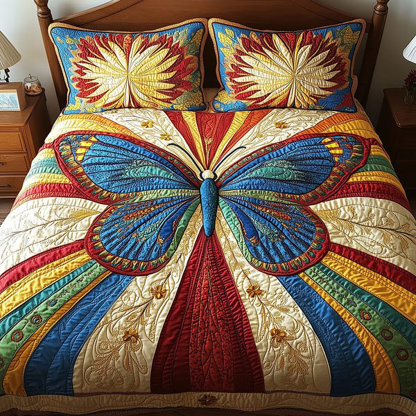 Butterfly Charm quilted 3-piece bedding set on a made bed with two matching pillow shams