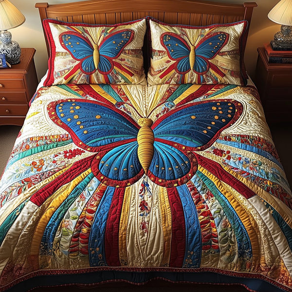 Butterfly Charm quilted 3-piece bedding set on a made bed with two matching pillow shams