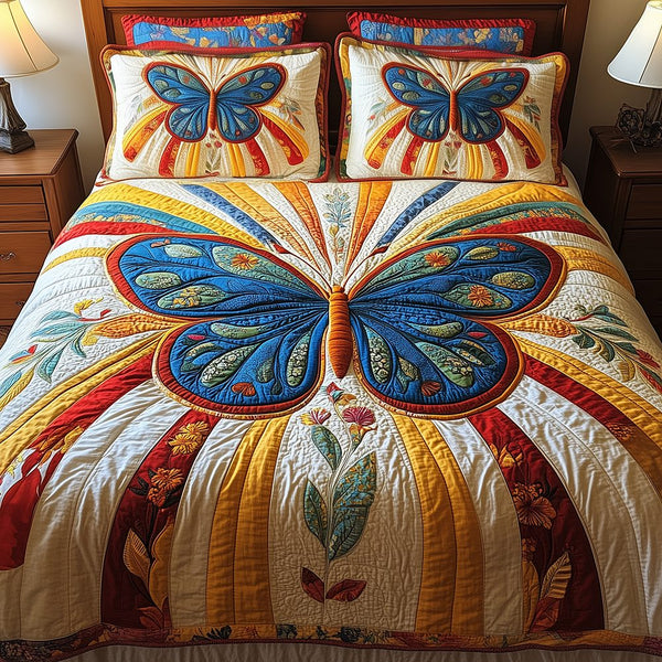 Butterfly Charm quilted 3-piece bedding set on a made bed with two matching pillow shams