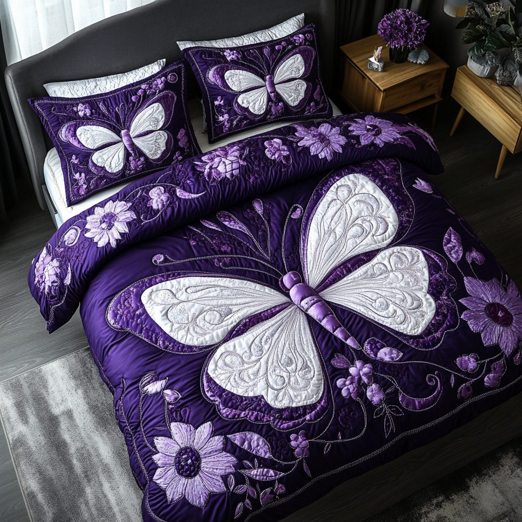 Butterfly Dance quilted 3-piece bedding set on a made bed with two matching pillow shams