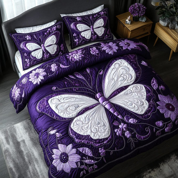 Butterfly Dance quilted 3-piece bedding set on a made bed with two matching pillow shams