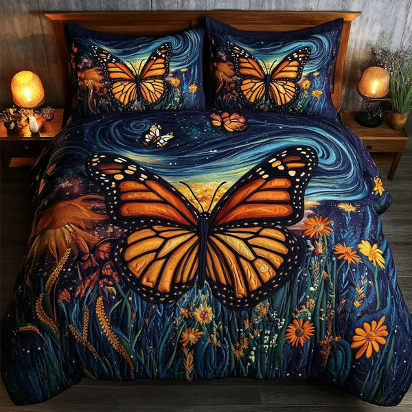 Butterfly Dreams quilted 3-piece bedding set on a made bed with two matching pillow shams