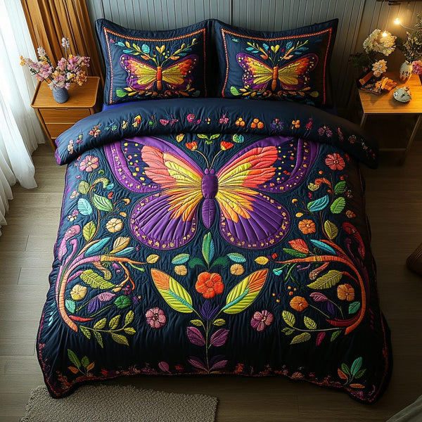 Butterfly Dreams quilted 3-piece bedding set on a made bed with two matching pillow shams