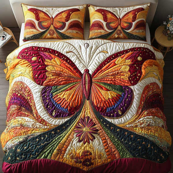Butterfly Dreams quilted 3-piece bedding set on a made bed with two matching pillow shams