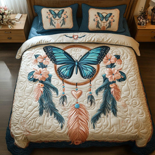 Butterfly Dreamscape quilted 3-piece bedding set on a made bed with two matching pillow shams