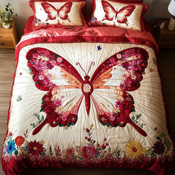 Butterfly Elegance quilted 3-piece bedding set on a made bed with two matching pillow shams