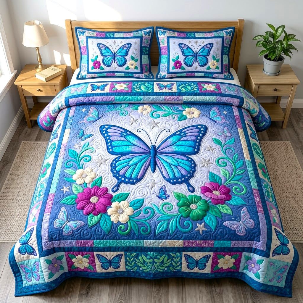 Butterfly Garden quilted 3-piece bedding set on a made bed with two matching pillow shams