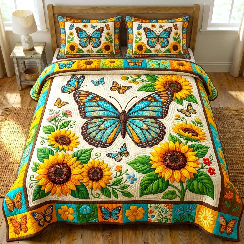 Butterfly Garden quilted 3-piece bedding set on a made bed with two matching pillow shams