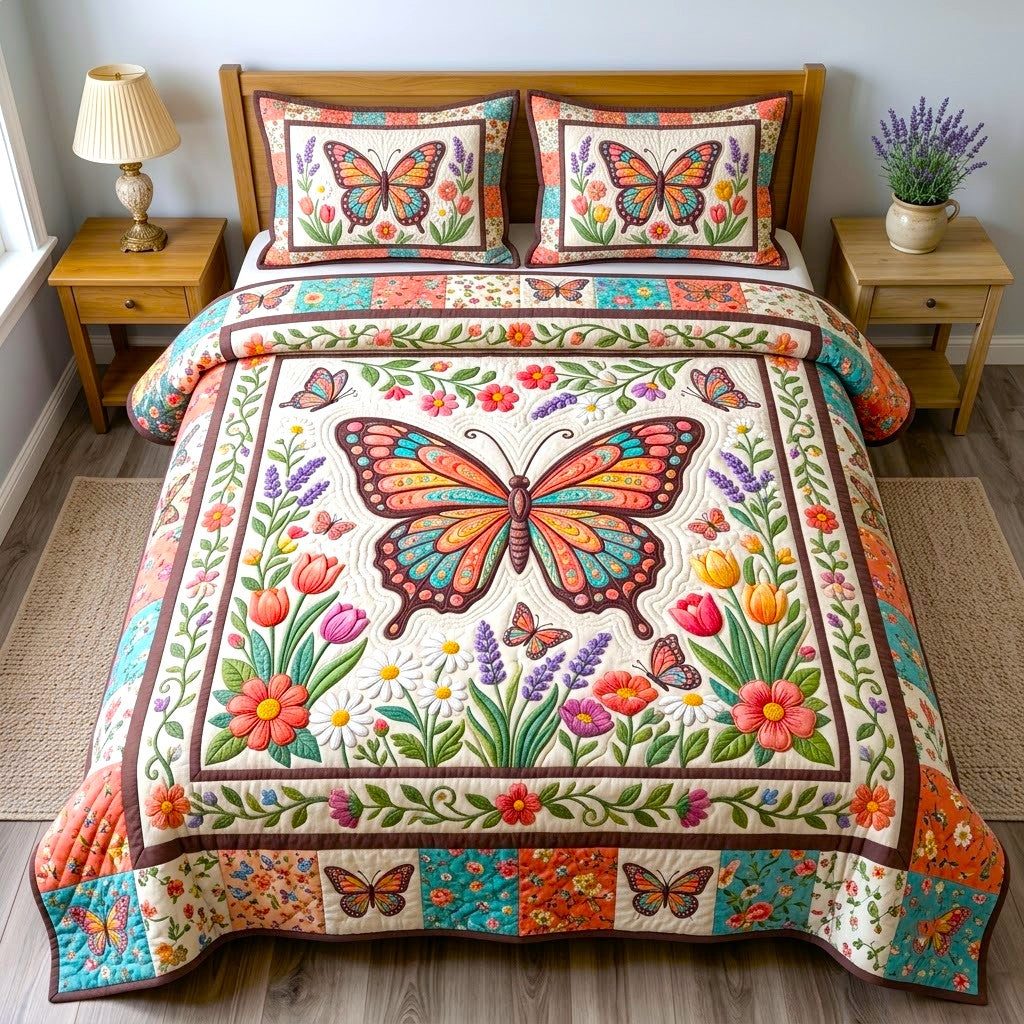 Butterfly Garden quilted 3-piece bedding set on a made bed with two matching pillow shams