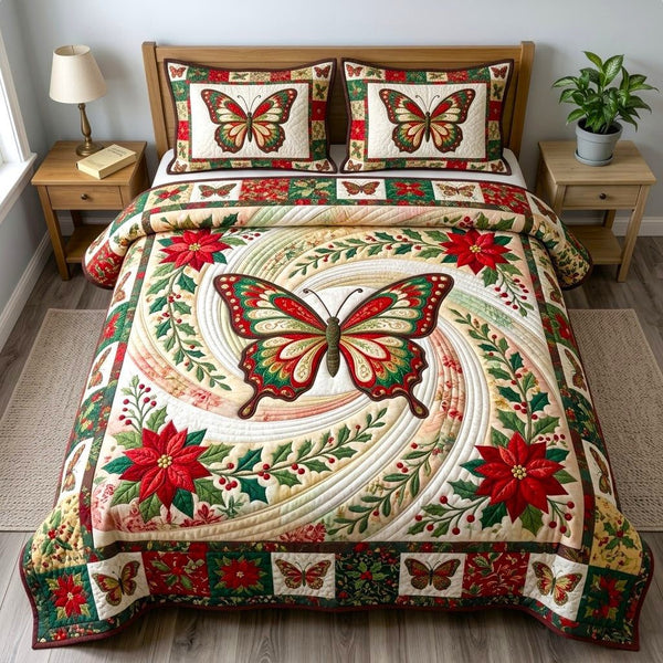 Butterfly Garden quilted 3-piece bedding set on a made bed with two matching pillow shams