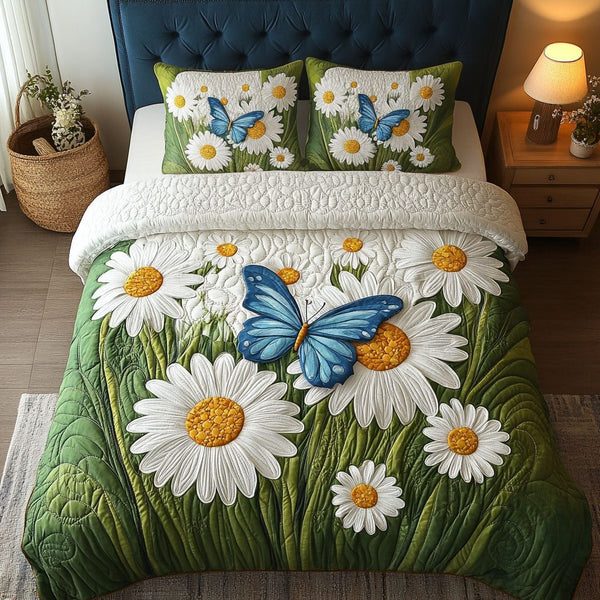 Butterfly Garden quilted 3-piece bedding set on a made bed with two matching pillow shams