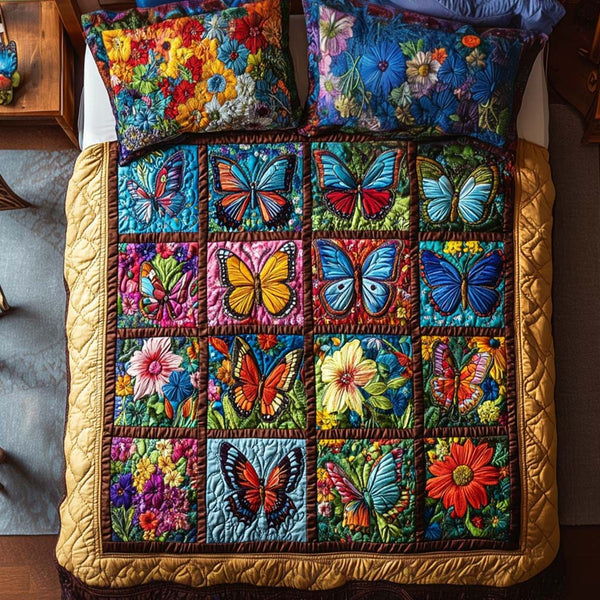 Butterfly Garden Whispers quilted 3-piece bedding set on a made bed with two matching pillow shams