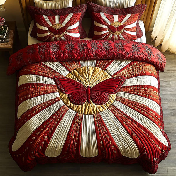 Butterfly Glow quilted 3-piece bedding set on a made bed with two matching pillow shams