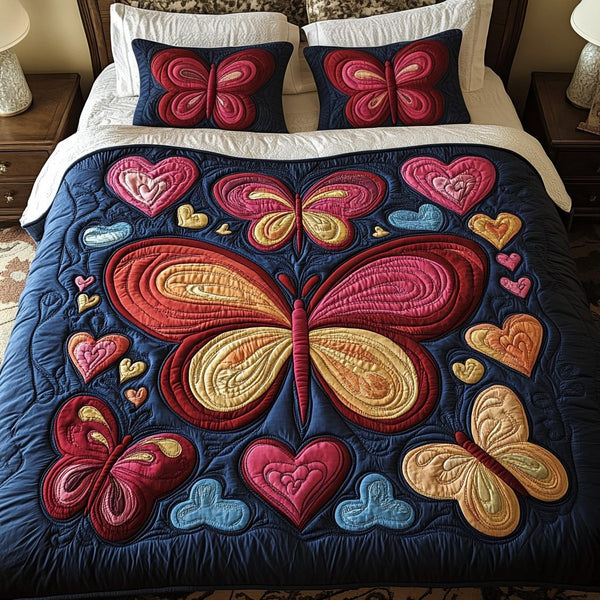 Butterfly Haven quilted 3-piece bedding set on a made bed with two matching pillow shams