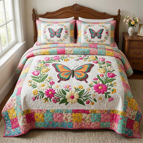 Butterfly Heaven quilted 3-piece bedding set on a made bed in a softly lit bedroom