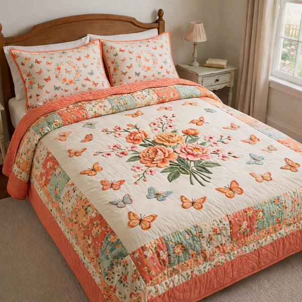 Butterfly Heaven quilted 3-piece bedding set on a made bed in a softly lit bedroom