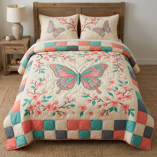 Butterfly Heaven quilted 3-piece bedding set on a made bed in a softly lit bedroom