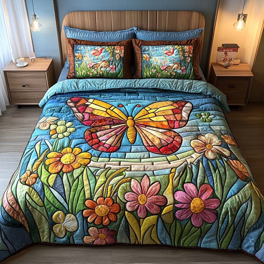 Butterfly Night quilted 3-piece bedding set on a made bed with two matching pillow shams