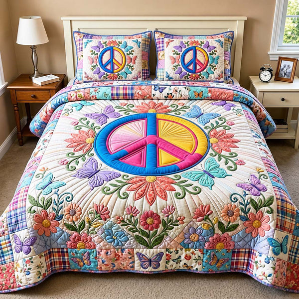 Butterfly Peace quilted 3-piece bedding set on a made bed with two matching pillow shams